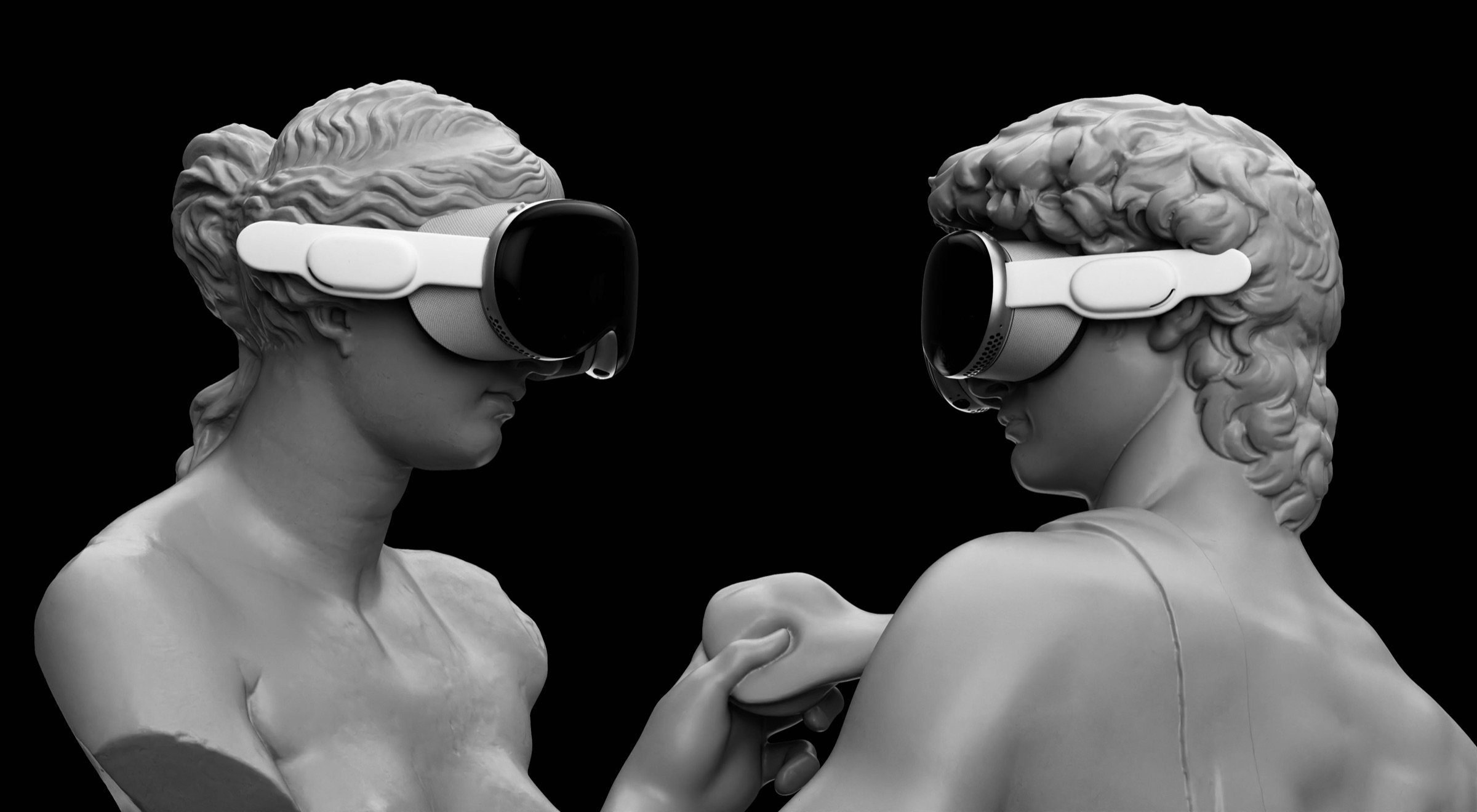 Classical statues of Venus and David wearing Apple Vision Pro headsets