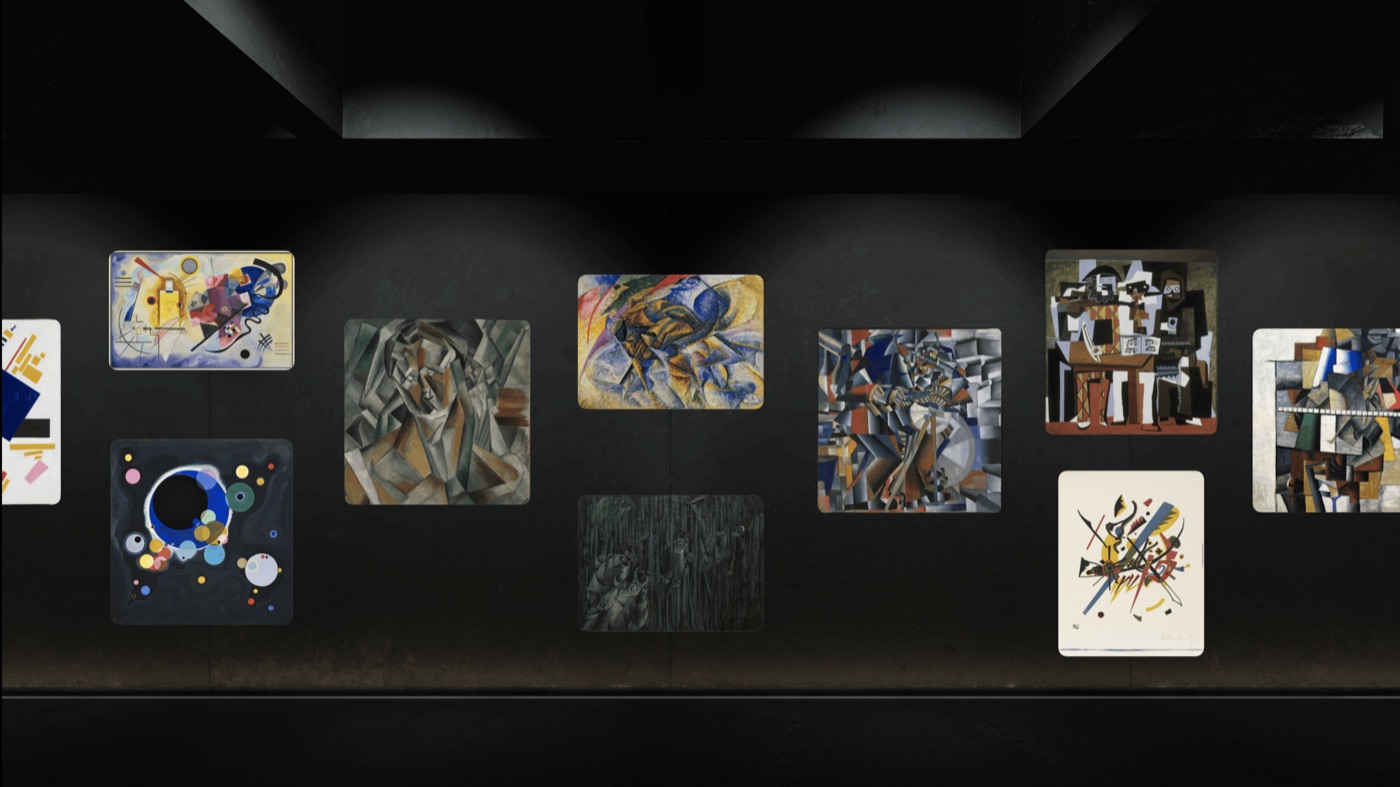 A dark gallery wall of modern artworks in Museas